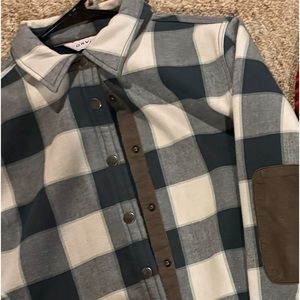 Size M Orvis brand blue and white flannel with elbow patches